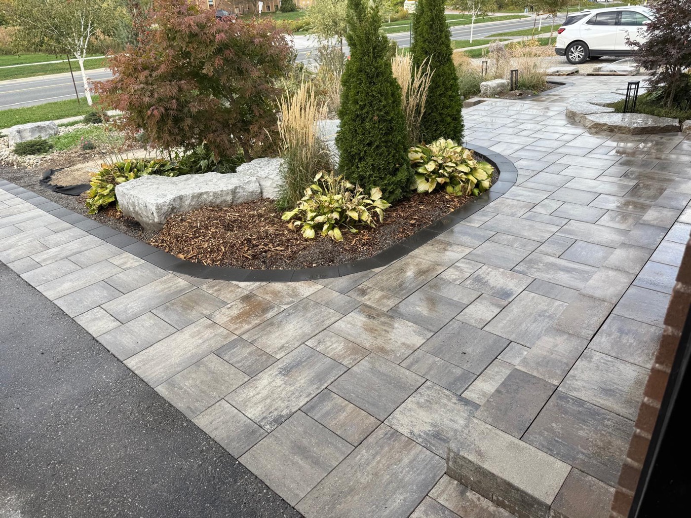 Finished interlock surface around a planted border