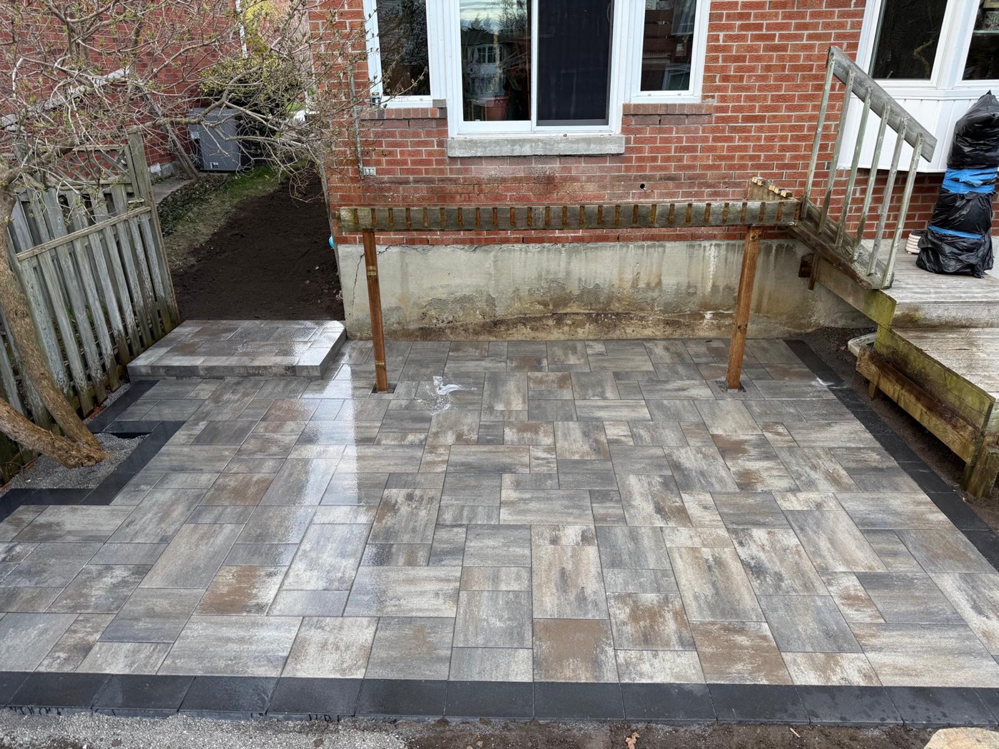 Finished interlock landing at a backyard entry